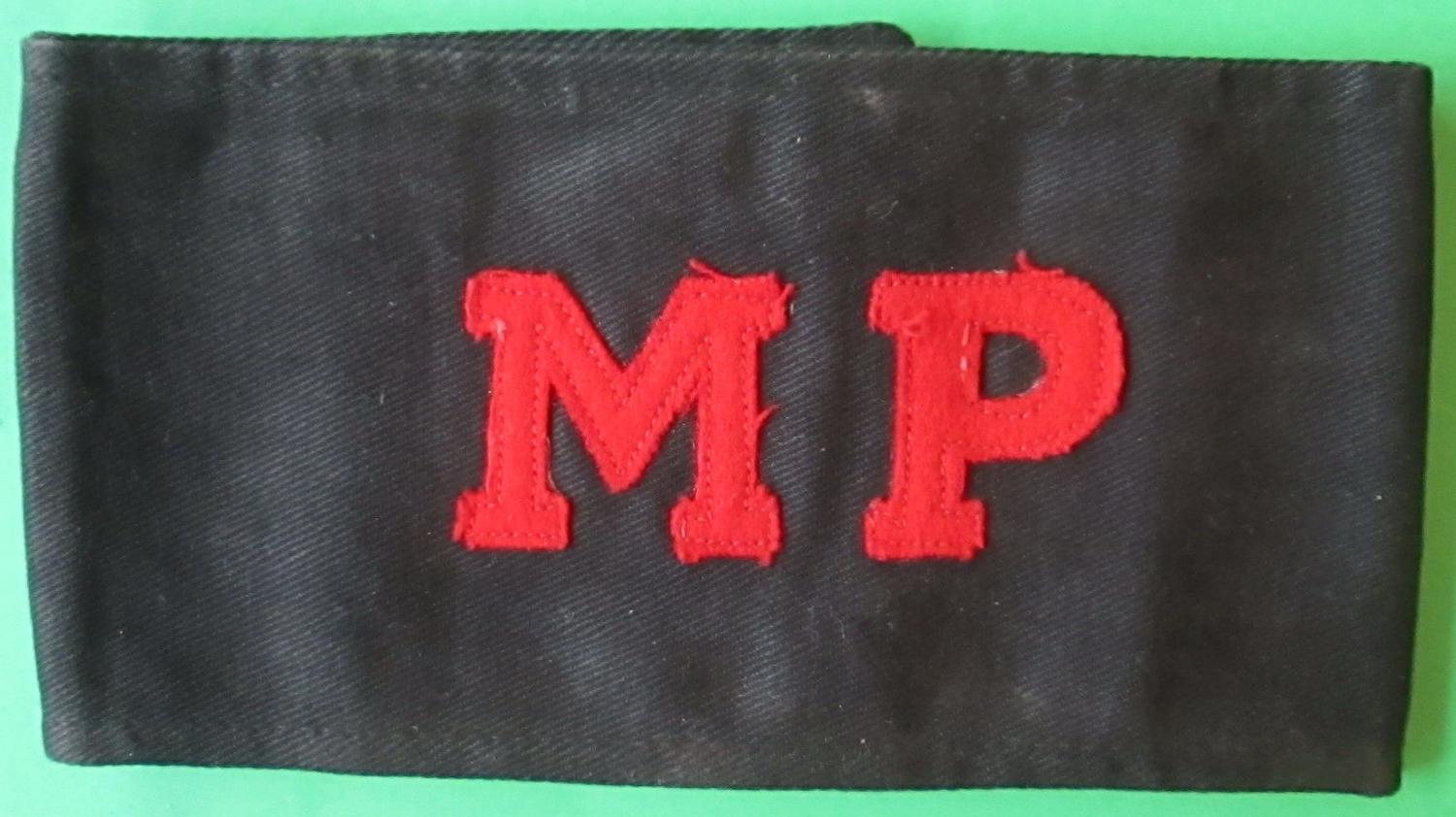 A WWII MILITARY POLICE ARM BAND