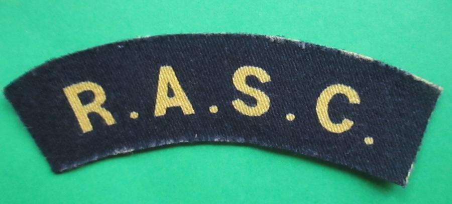 A PRINTED WWII ROYAL ARMY SERVICE CORPS SHOULDER TITLE