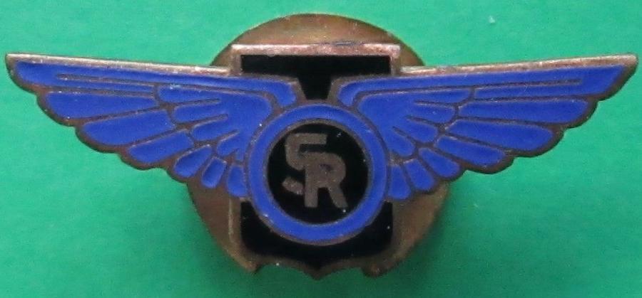 A BLUE AND LILAC SAUNDERS ROE BADGE WITH THE NUMBER 630 TO THE REVERSE