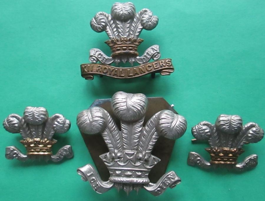 A SCARCE VICTORIAN GROUPING OF BADGES TO THE 12th ROYAL LANCERS 