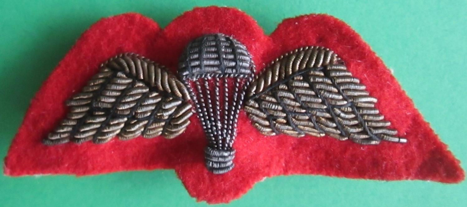 A RED BACKED BULLION WIRE JUMP WING
