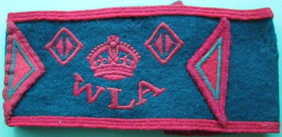 A WWII 3 YEAR WOMAN'S LAND ARMY ARM BAND