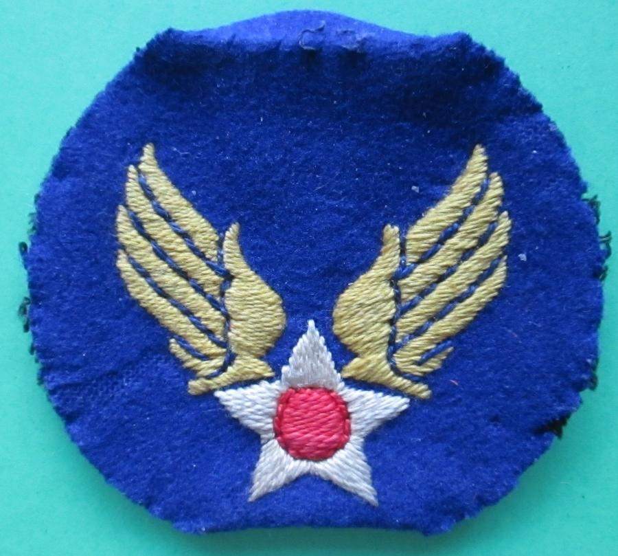A WWII BRITISH MADE US ARMY AIR FORCES ARM BADGE