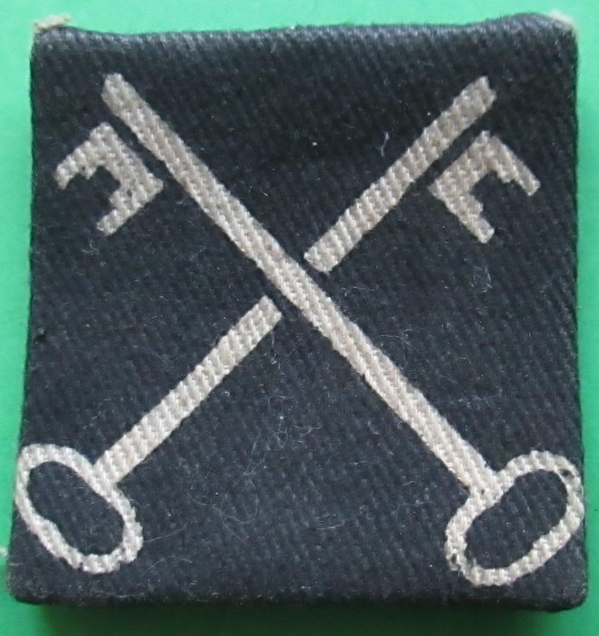 A 2ND CORPS MOUNTED AND WORN FORMATION PATCH
