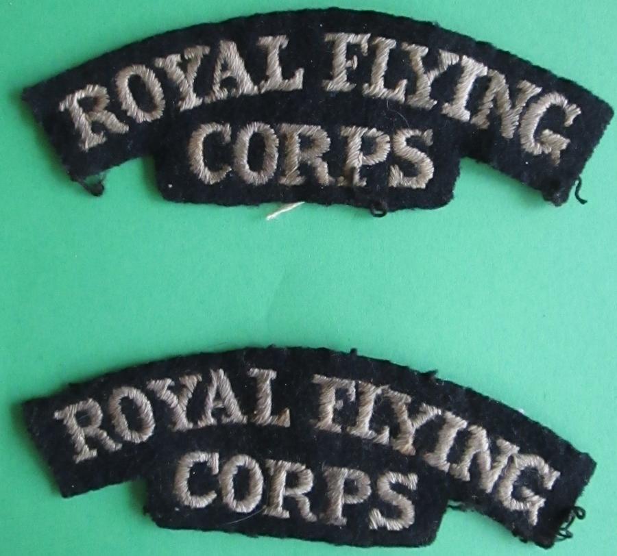 A WWI PAIR OF ROYAL FLYING CORPS SHOULDER TITLES