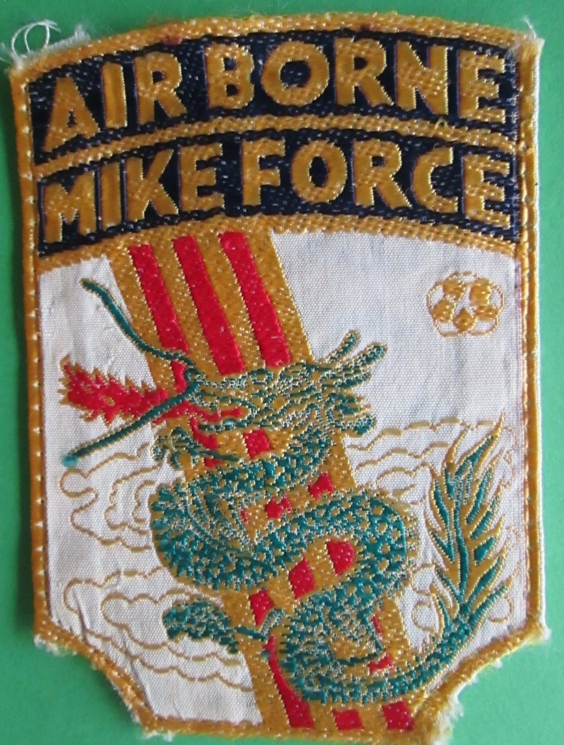 A RARE VIETNAM MADE MIKE FORCE BADGE