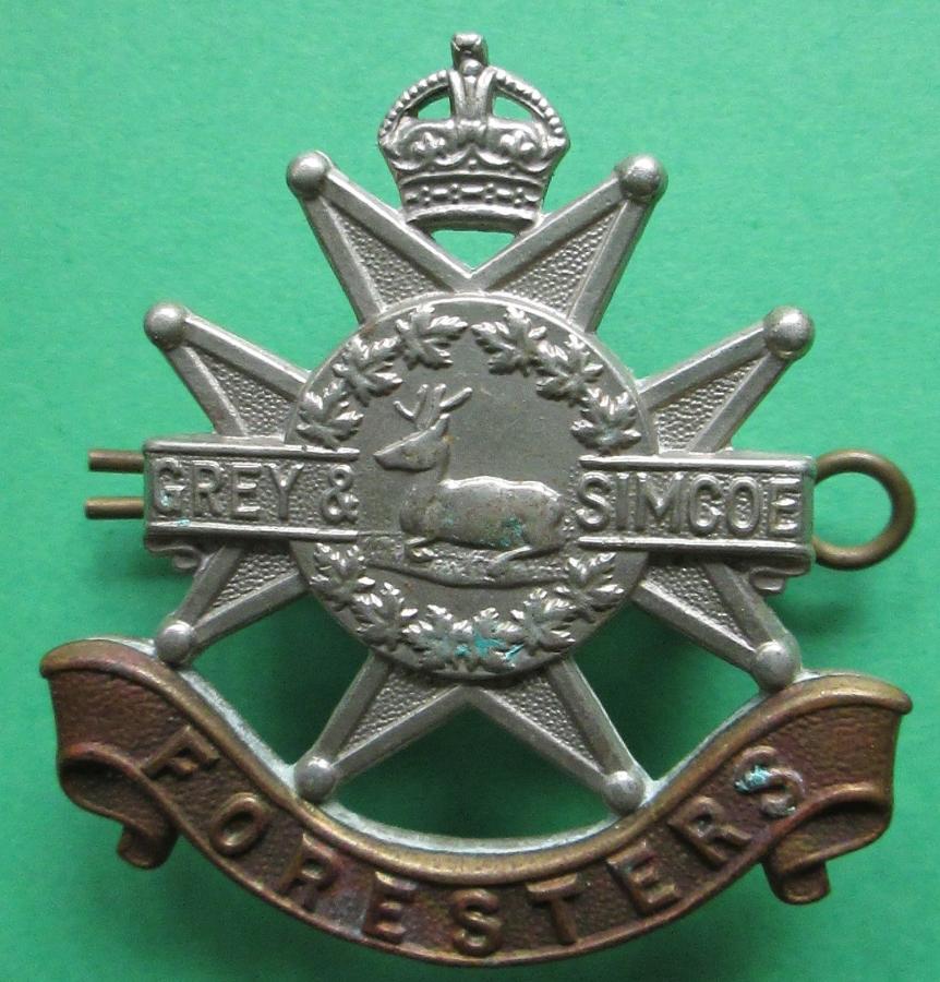 A CANADIAN GREY AND SIMCOE FORESTERS CAP BADGE