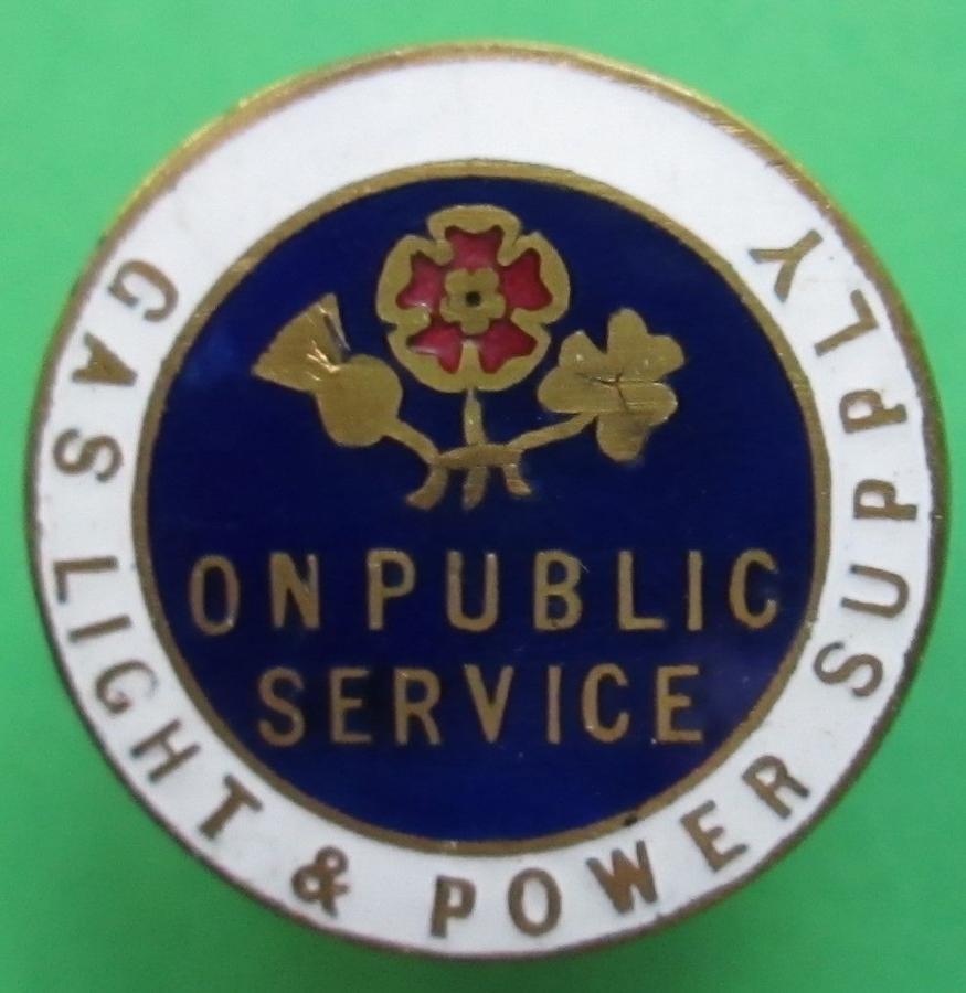A ON PUBLIC SERVICE GAS LIGHT AND POWER SUPPLY BADGE
