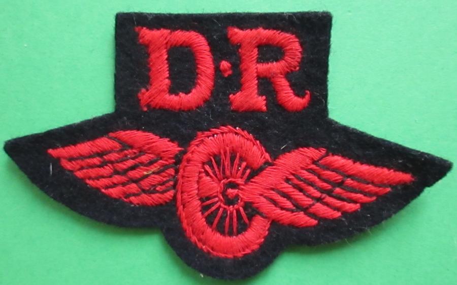 A RED ON BLACK DISPATCH RIDERS ARM BADGE