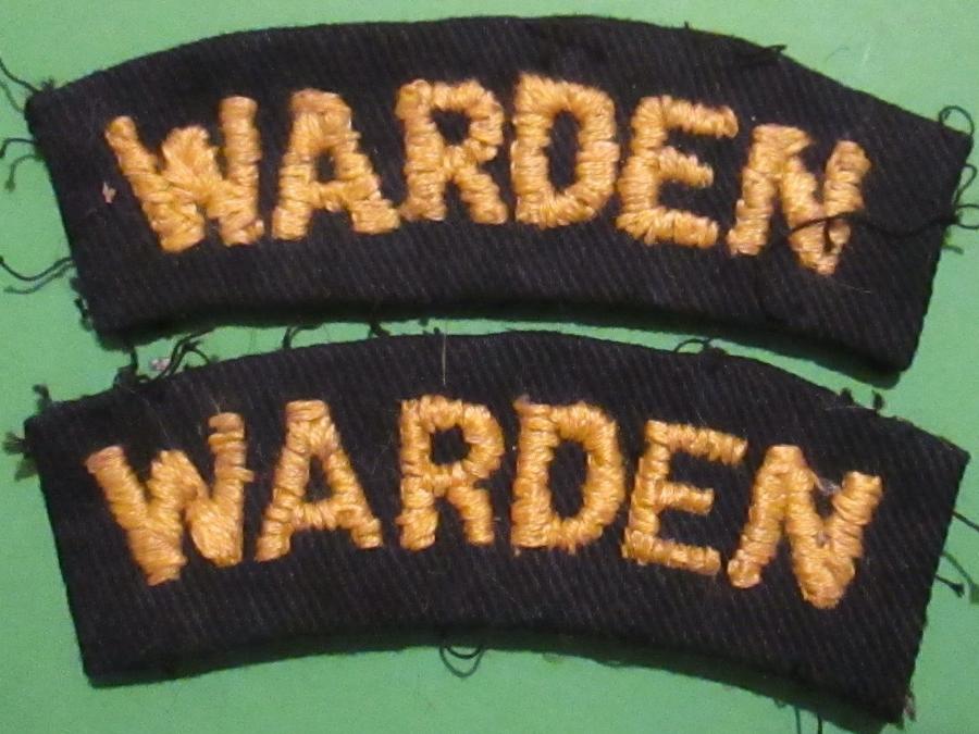 A PAIR OF WARDEN'S WWII CIVIL DEFENCE SHOULDER TITLES
