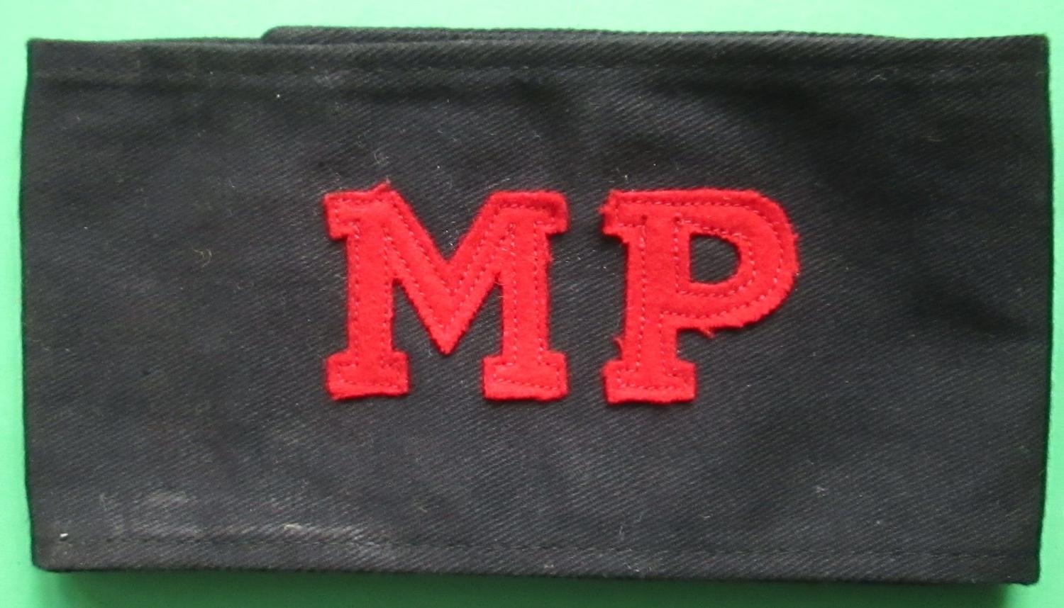 A WWII MILITARY POLICE ARMBAND