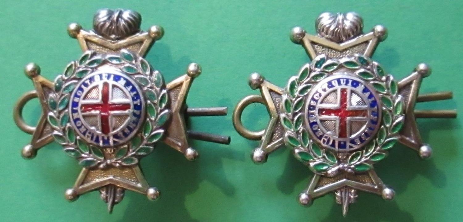 A GOOD PAIR OF THE OFFICERS SILVER PLATED SUSSEX REGT COLLARS