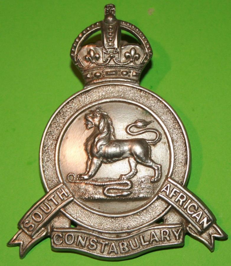 A SOUTH AFRICAN CONSTABULARY HELMET BADGE