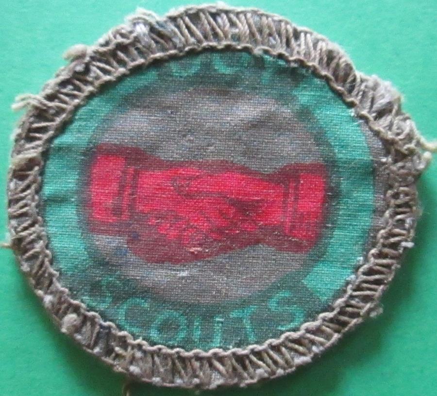 A WWII VERY RARE PRINTED BOYS SCOUT INTERPRETERS BADGE