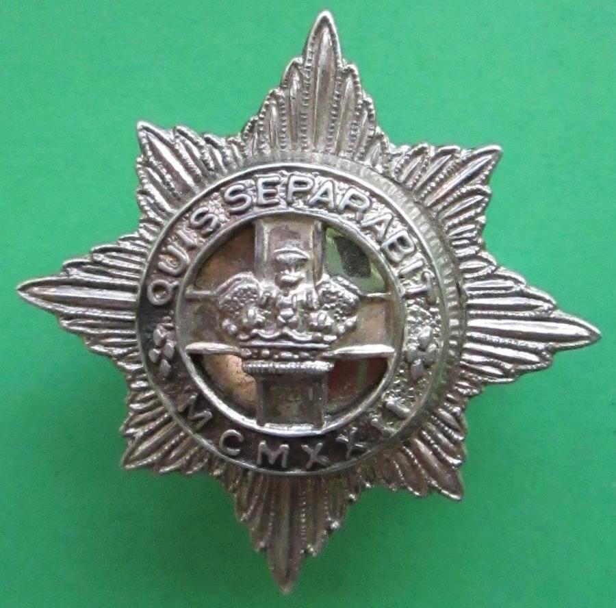 A 1988 OFFICERS SILVER HALLMARKED 4TH / 7TH DRAGOON GUARDS CAP BADGE