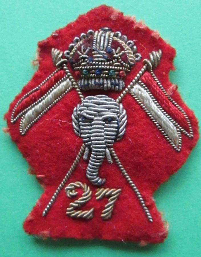 A RARE EXAMPLE OFT HE 27th LANCERS OFFICERS BULLION WIRE CAP BADGE