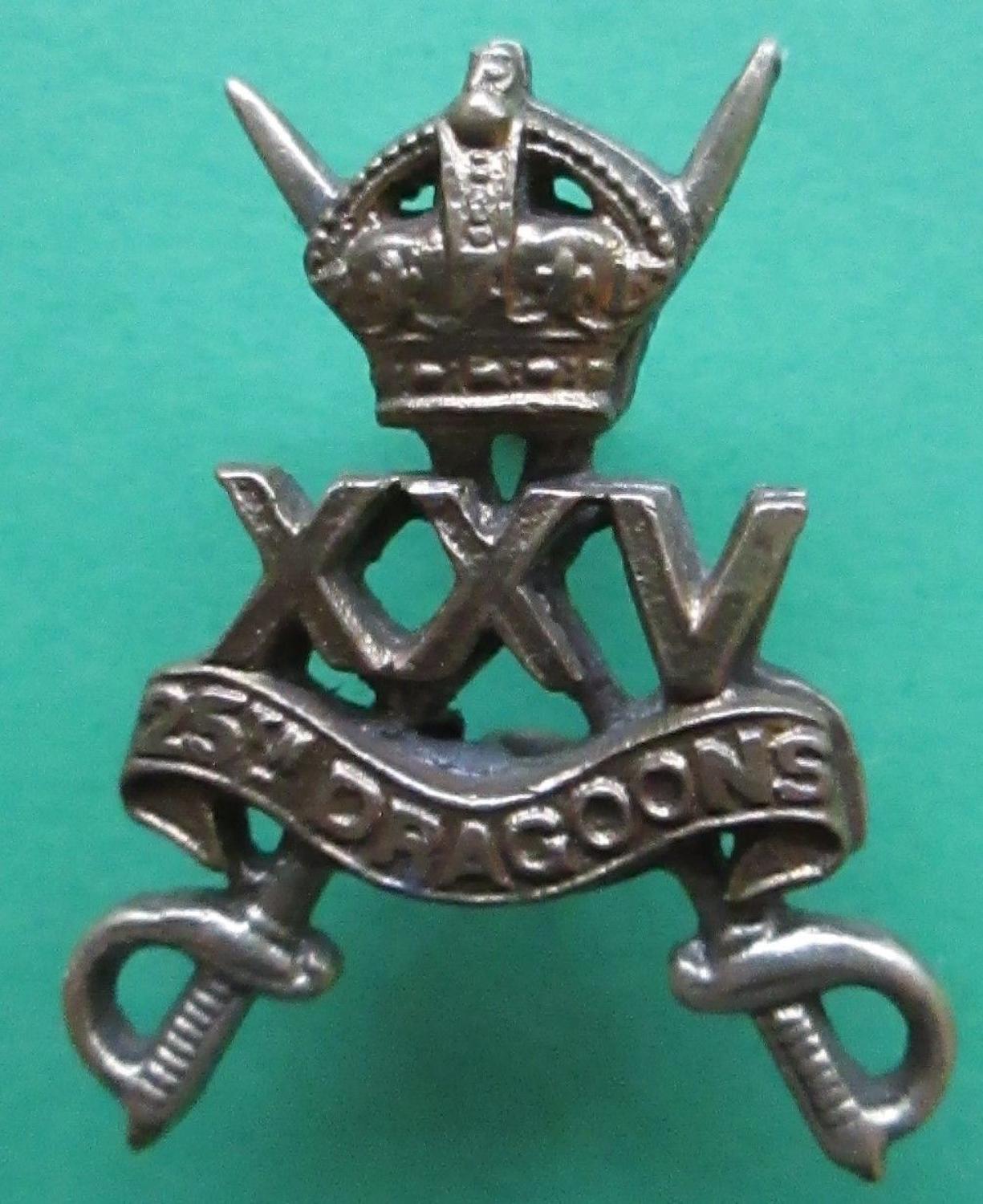 A GOOD SCARCE EXAMPLE OF THE 25th DRAGOONS CAP BADGE