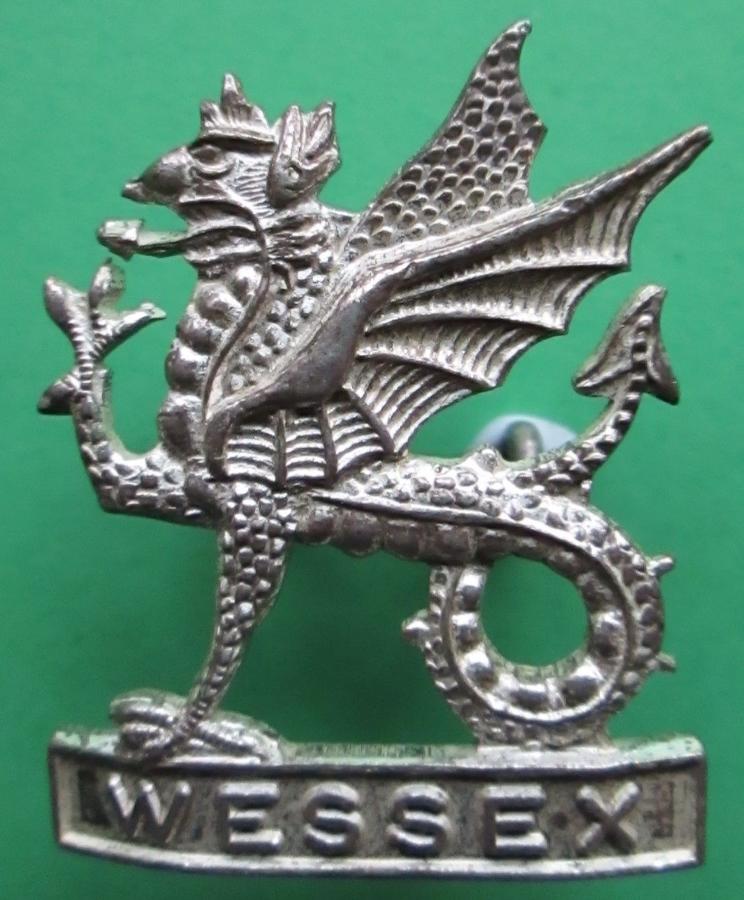 A SILVER PLATED WESSEX TERRITORIAL REGT CAP BADGE