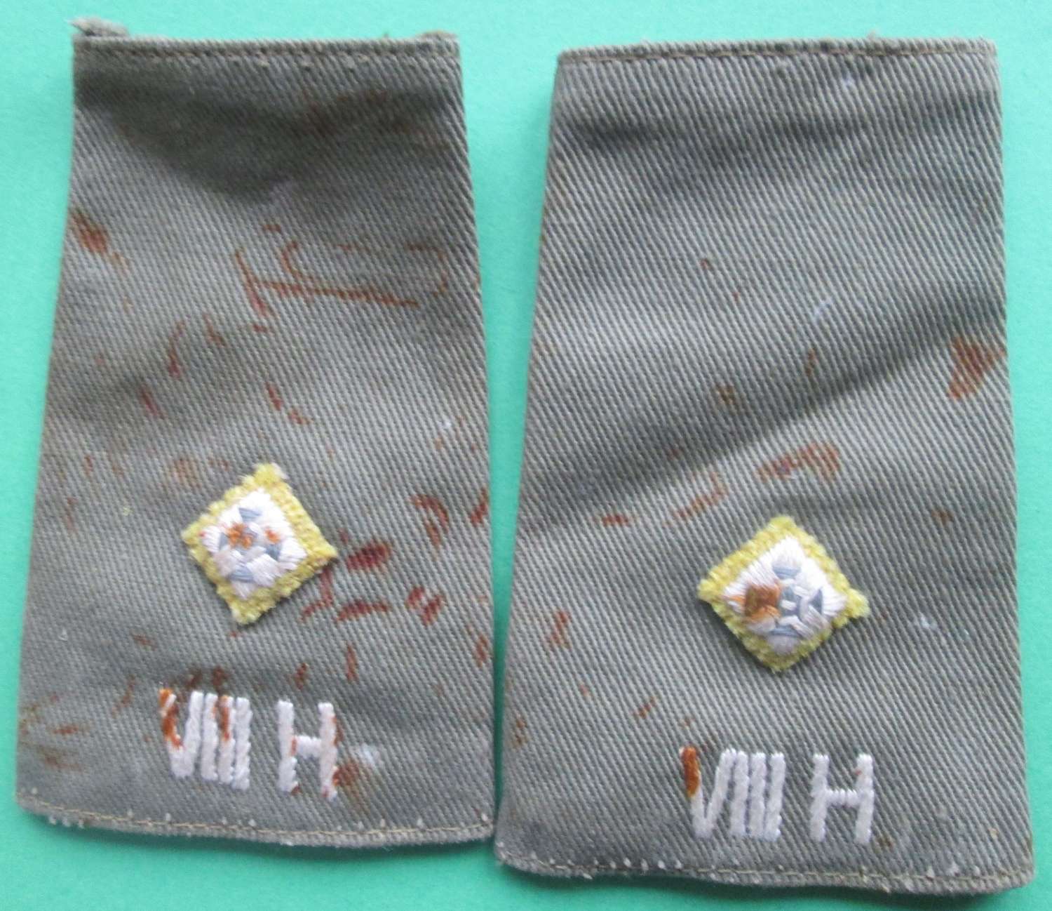 A MATCHING USED PAIR OF 8th HUSSARS POST WWII RANK SLIDES