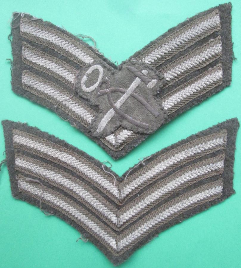 A MATCHING PAIR OF WWII SGTS STRIPS WITH A ARMOURS BADGED ATTACHED
