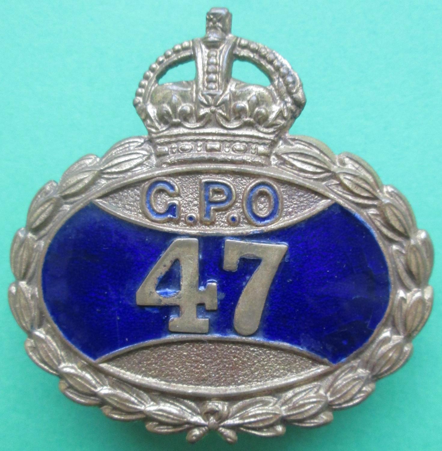 A PRE 1952 G.P.O BADGE WITH KING'S CROWN