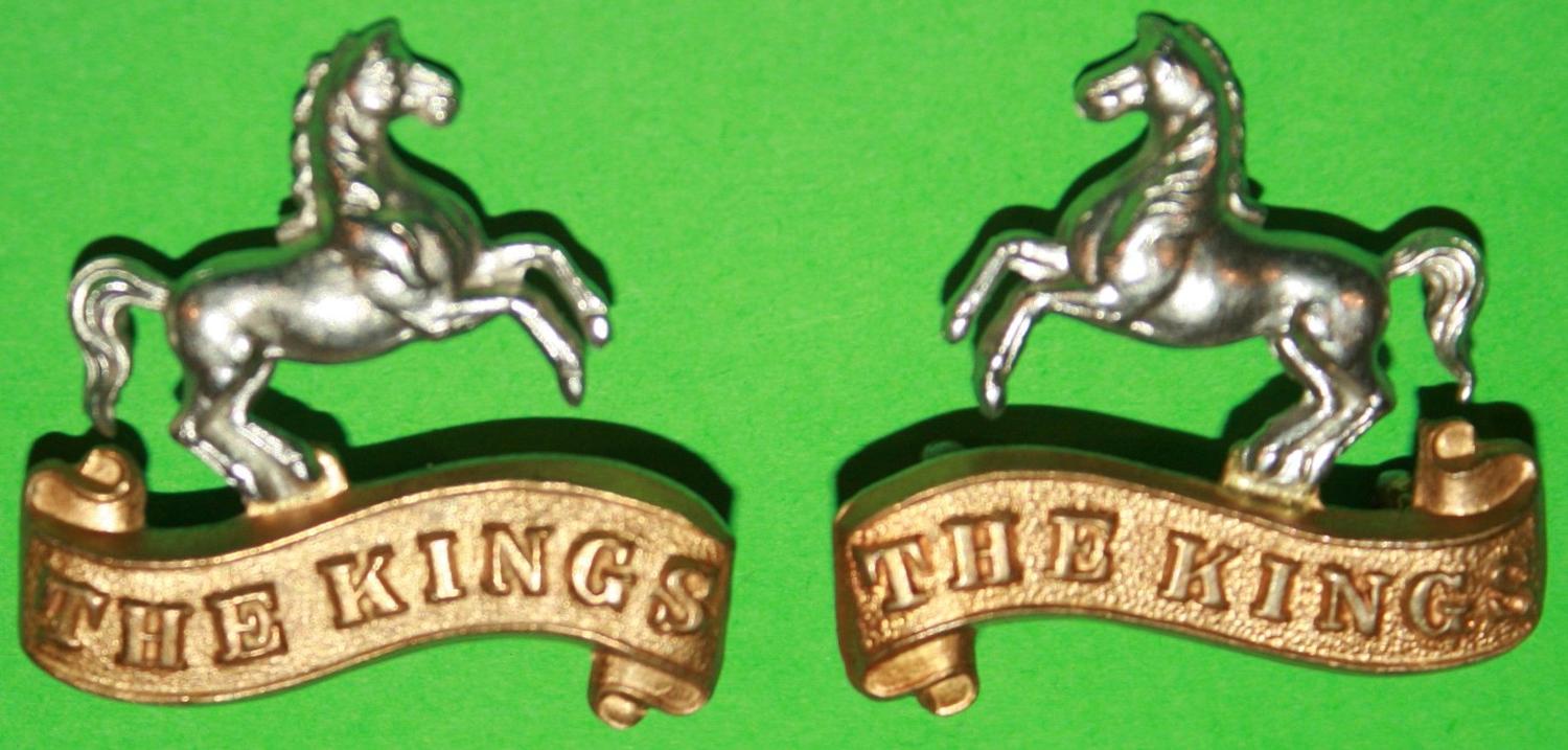 A GOOD MATCHING PAIR OF THE KINGS LIVERPOOL REGT OR'S COLLAR BADGES