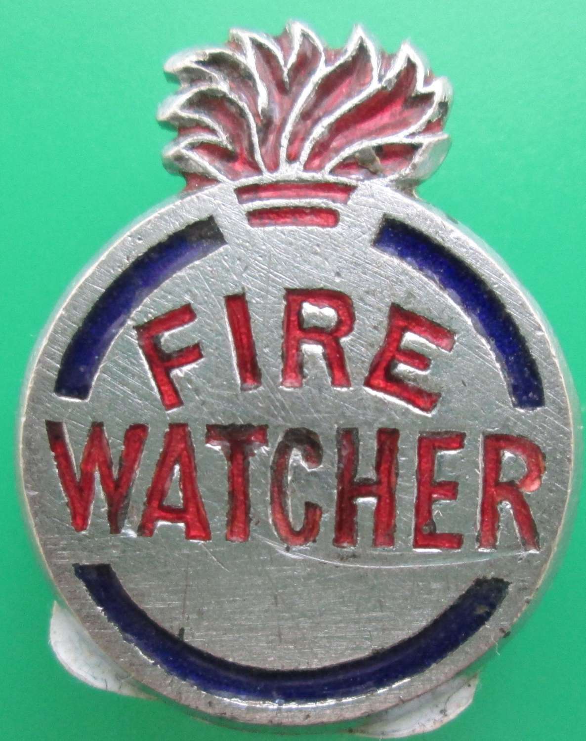 A WWII PERIOD FIRE WATCHERS BADGE