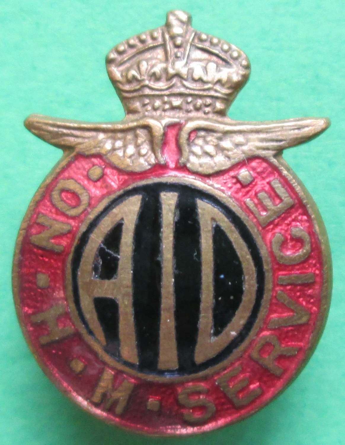 A SMALL PIN BADGE FOR THE AIR INSPECTOR DEPARTMENT