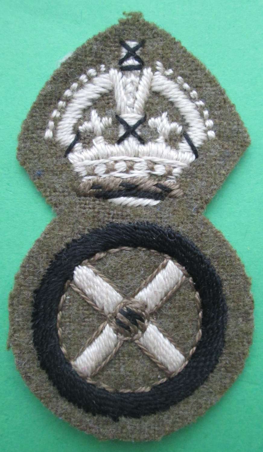 A WWII PERIOD DRIVER INSTRUCTORS BADGE