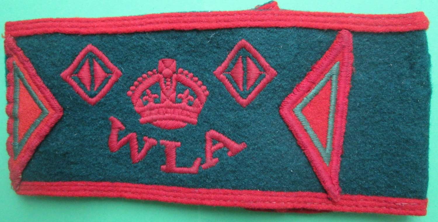A WWII WOMAN'S LAND ARMY 3 YEAR SERVICE ARM BAND