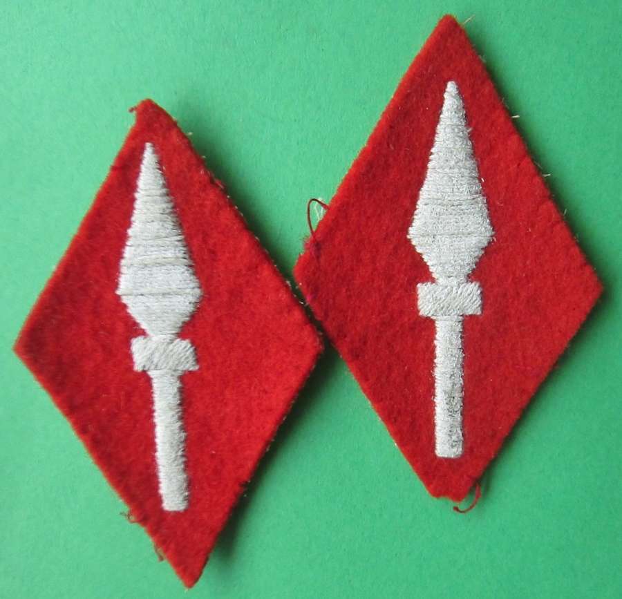 A PAIR OF WOVEN 1ST CORPS FORMATION SIGNS