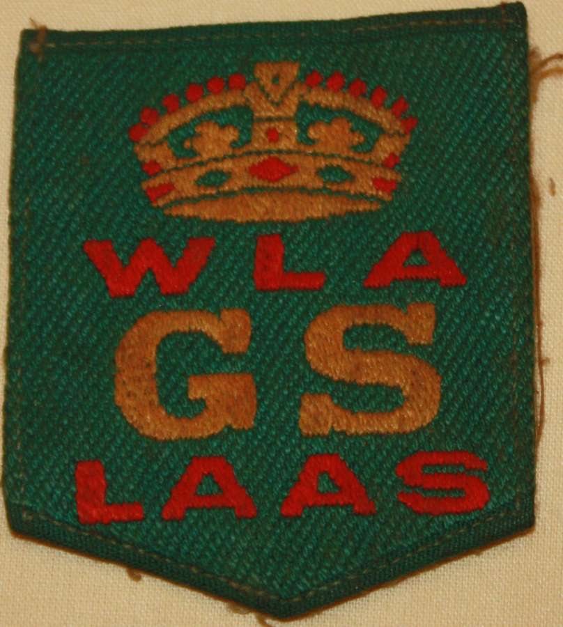 A WWI WOMENS LAND ARMY GOOD SERVICE ARM BADGE