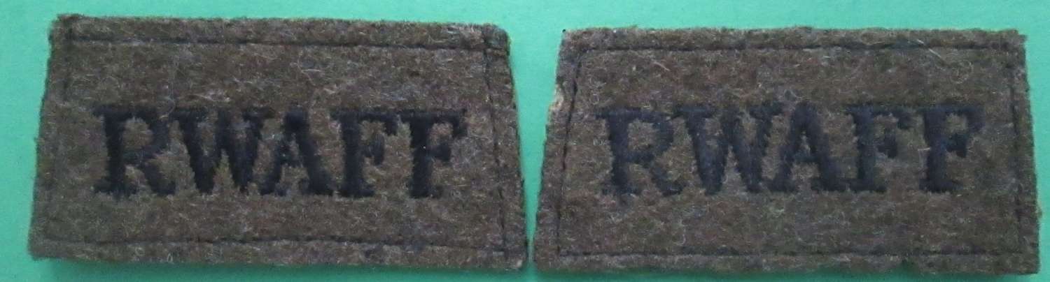 A PAIR OF RWAFF ( ROYAL WEST AFRICA FRONTIER FORCE )SLIDE ON TITLES
