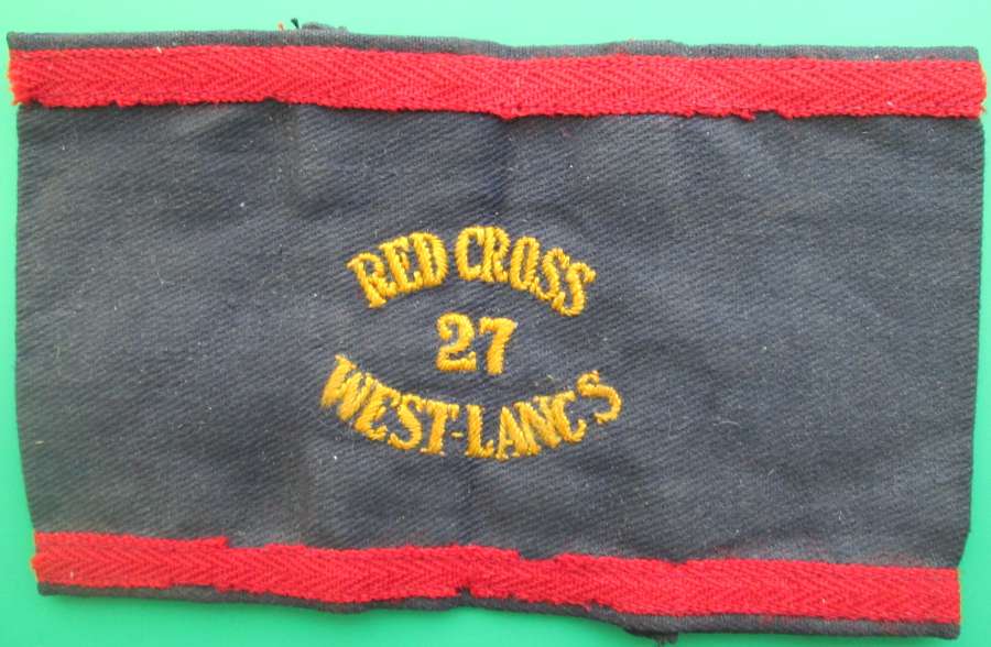 A RED CROSS ARM BAND FOR THE 27 WEST LANCS