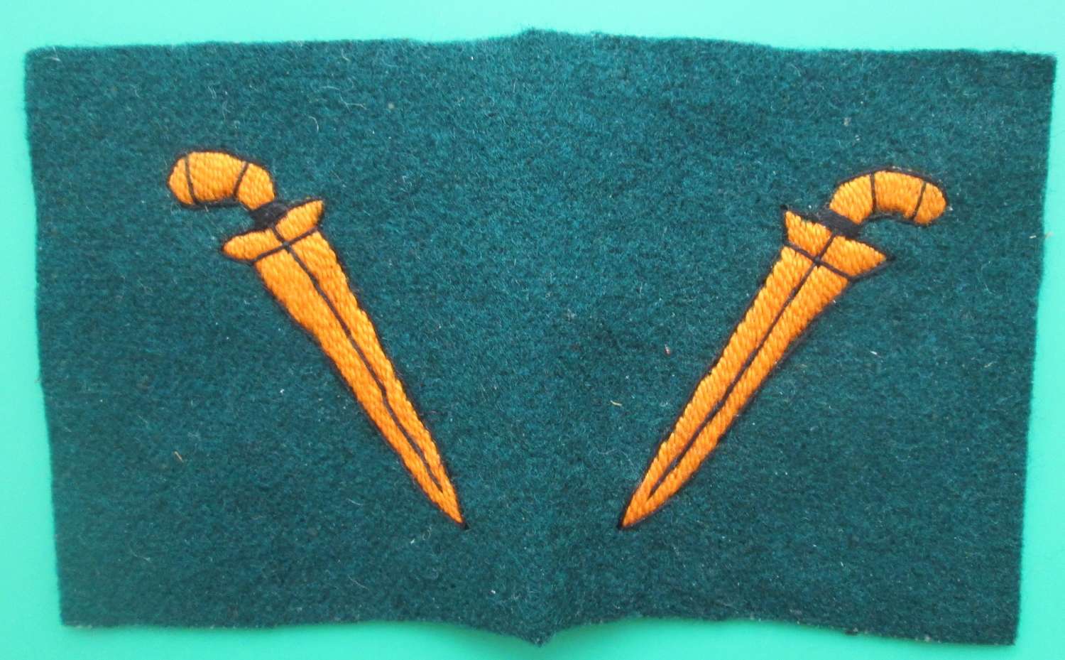 A PAIR OF UNCUT SEWN MALAYA COMMAND FORMATION SIGNS