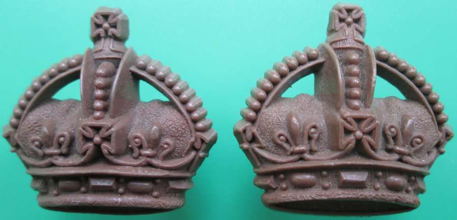 A PAIR OF PLASTIC WWII MAJORS CROWNS