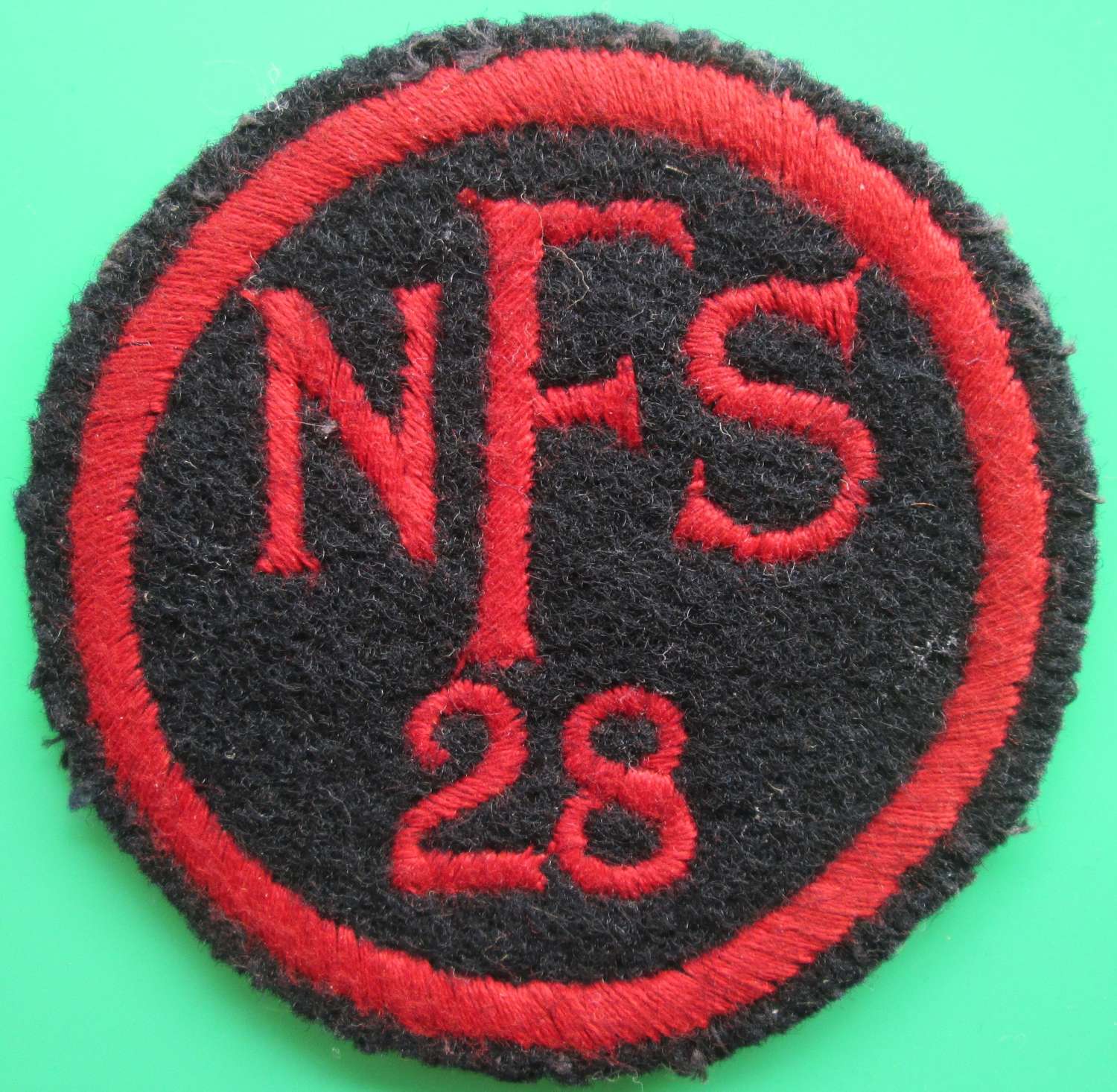 A NATIONAL FIRE SERVICE BREAST BADGE