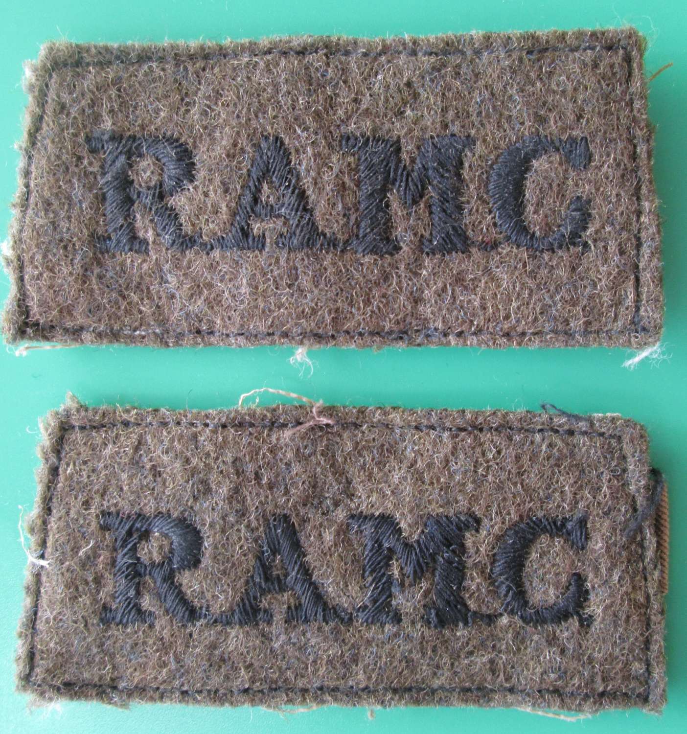 A PAIR OF ROYAL ARMY MEDICAL CORPS SLIP ON TITLES