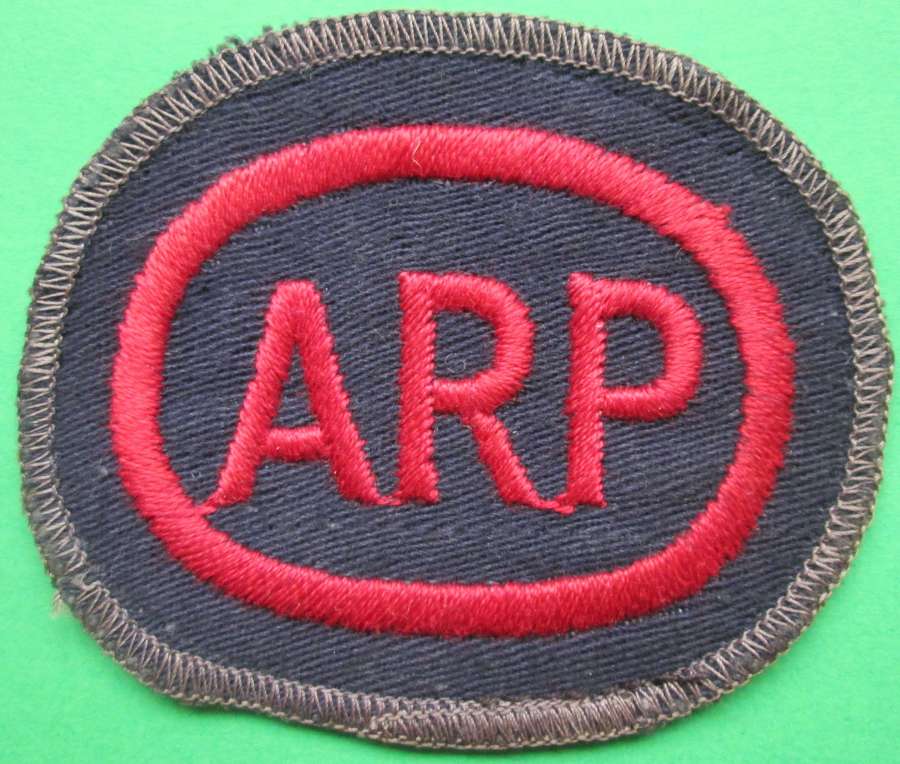 A GOOD WWII OVAL ARP BREAST BADGE