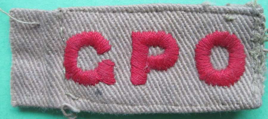 A WWII HOME GUARD GPO STAFF SHOULDER TITLE
