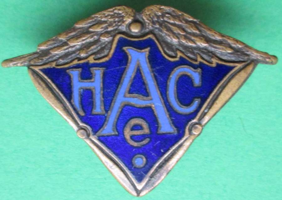A WWI PERIOD AIRCRAFT MAKERS BADGE H A C E LAPEL FITTING