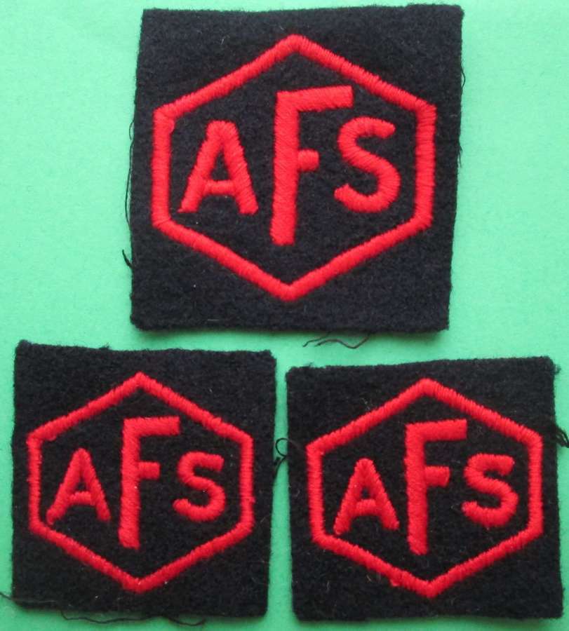 A SET OF AUXILIARY FIRE SERVICE BADGES