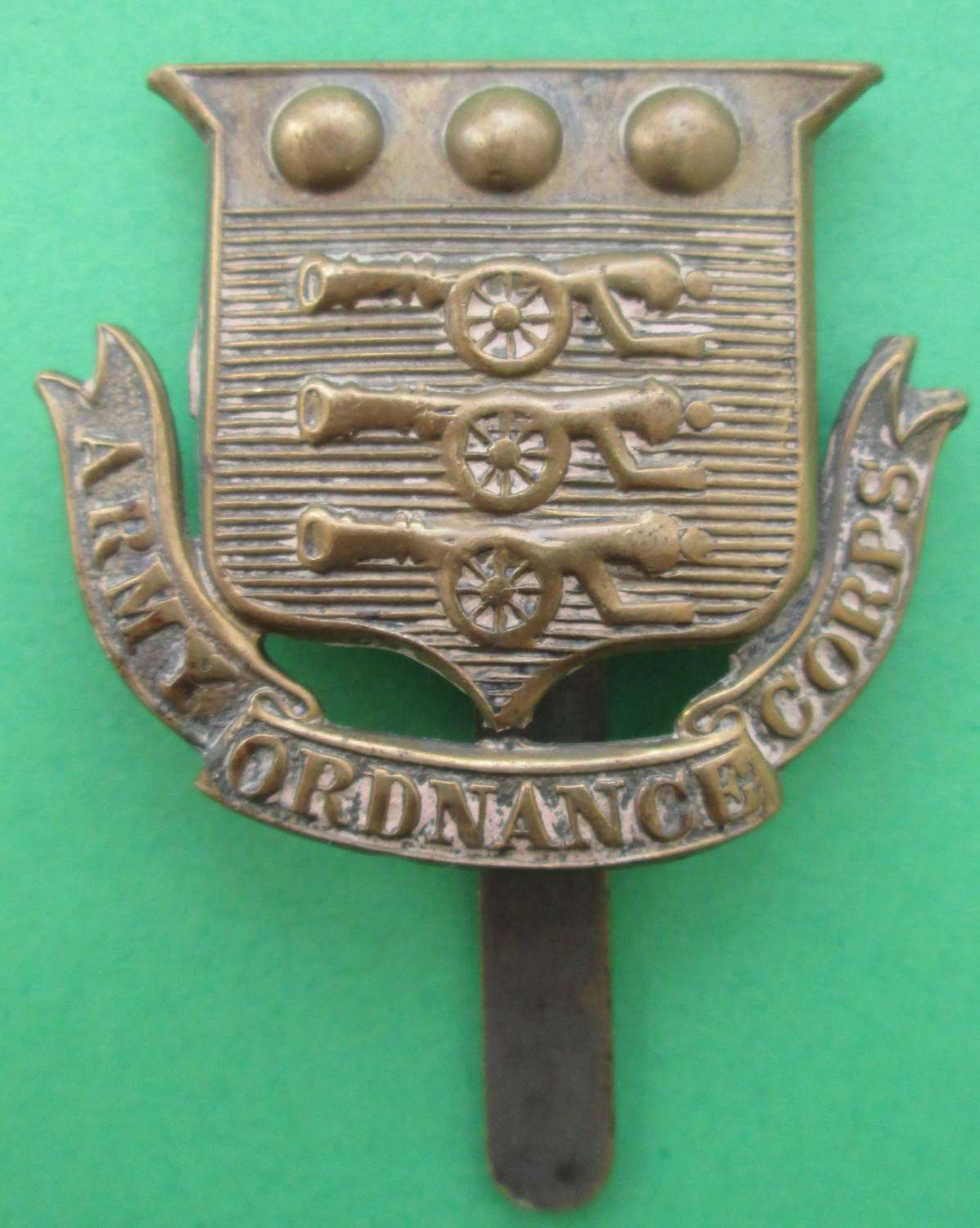 A PRE 1918 ARMY ORDNANCE CORPS CAP BADGE OR'S EXAMPLE
