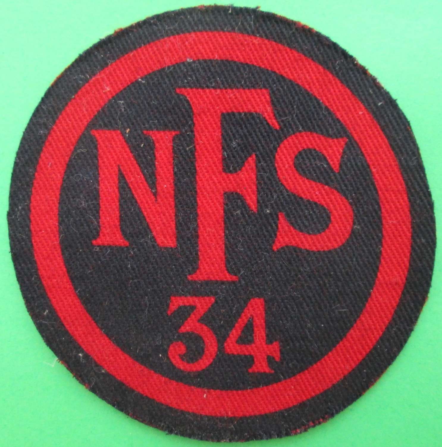 A NATIONAL FIRE SERVICE BADGE AREA 34