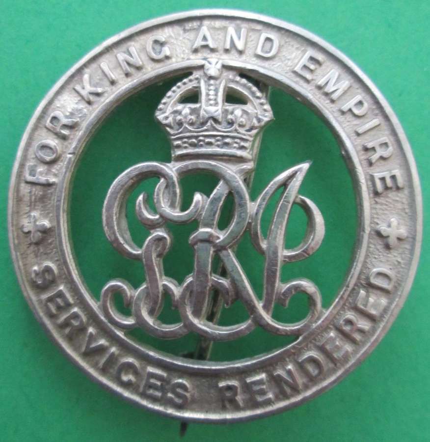 A GOOD WWI SILVER WOUND BADGE