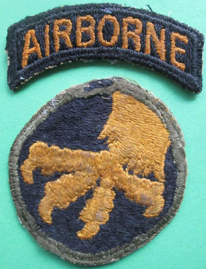 A VERY GOOD WWII 2 PART US 17TH AIRBORNE FORCE REVERSE CLAW BADGE