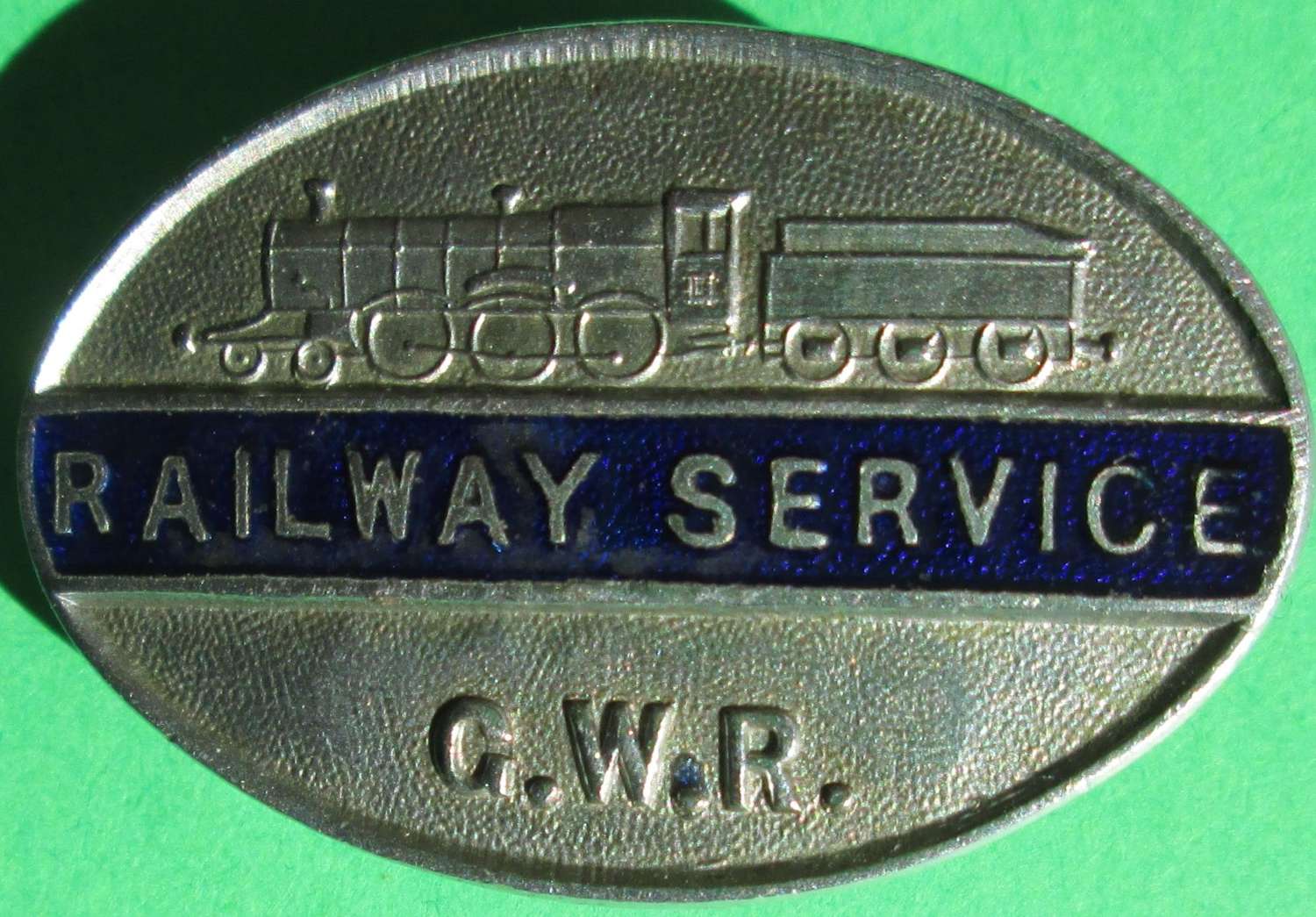 A RAILWAY SERVICE LAPEL BADGE FOR THE GREAT WESTERN RAILWAY