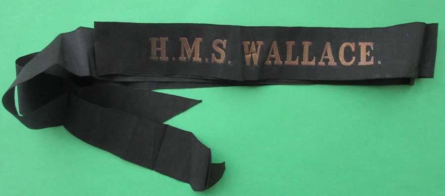 A NICE UNCUT FULL LENGTH CAP TALLY FOR THE HMS WALLACE