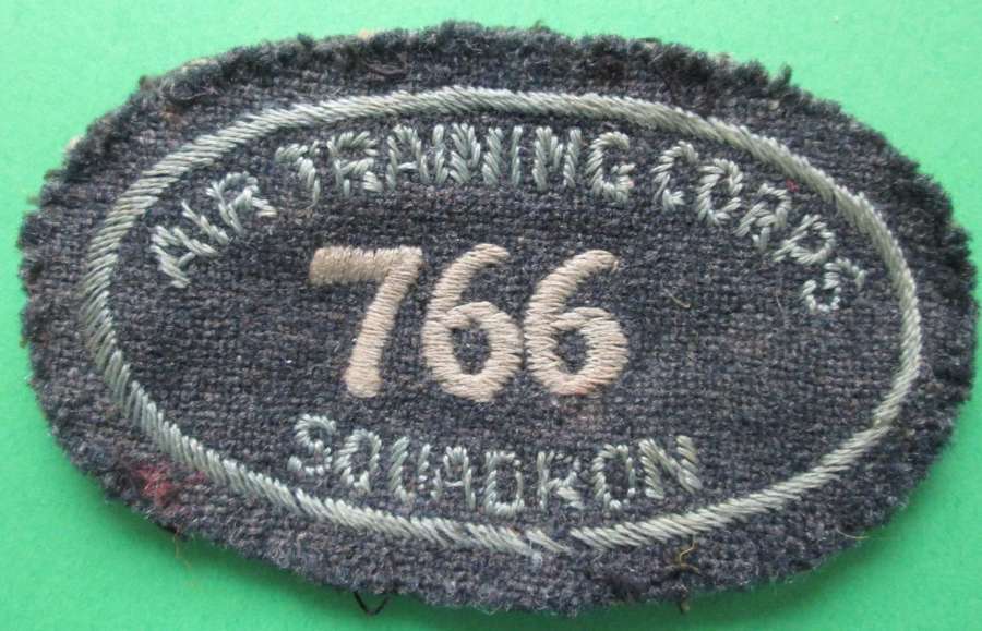 A GOOD LATE WWII EARLY POST WWII ATC 766 SQUADRON ARM BADGE