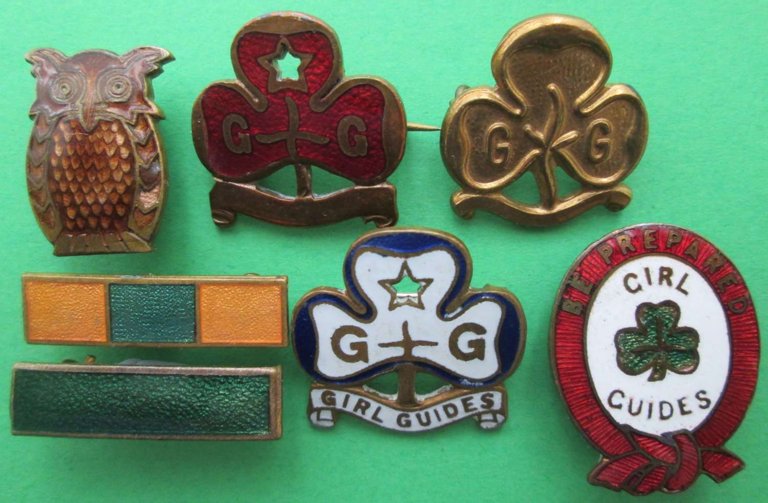 A COLLECTION OF GUIDE BADGES